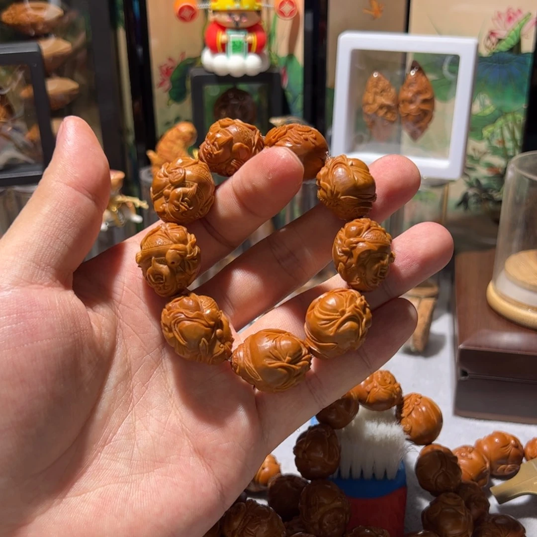 用***0橄榄核雕手工八宝财神