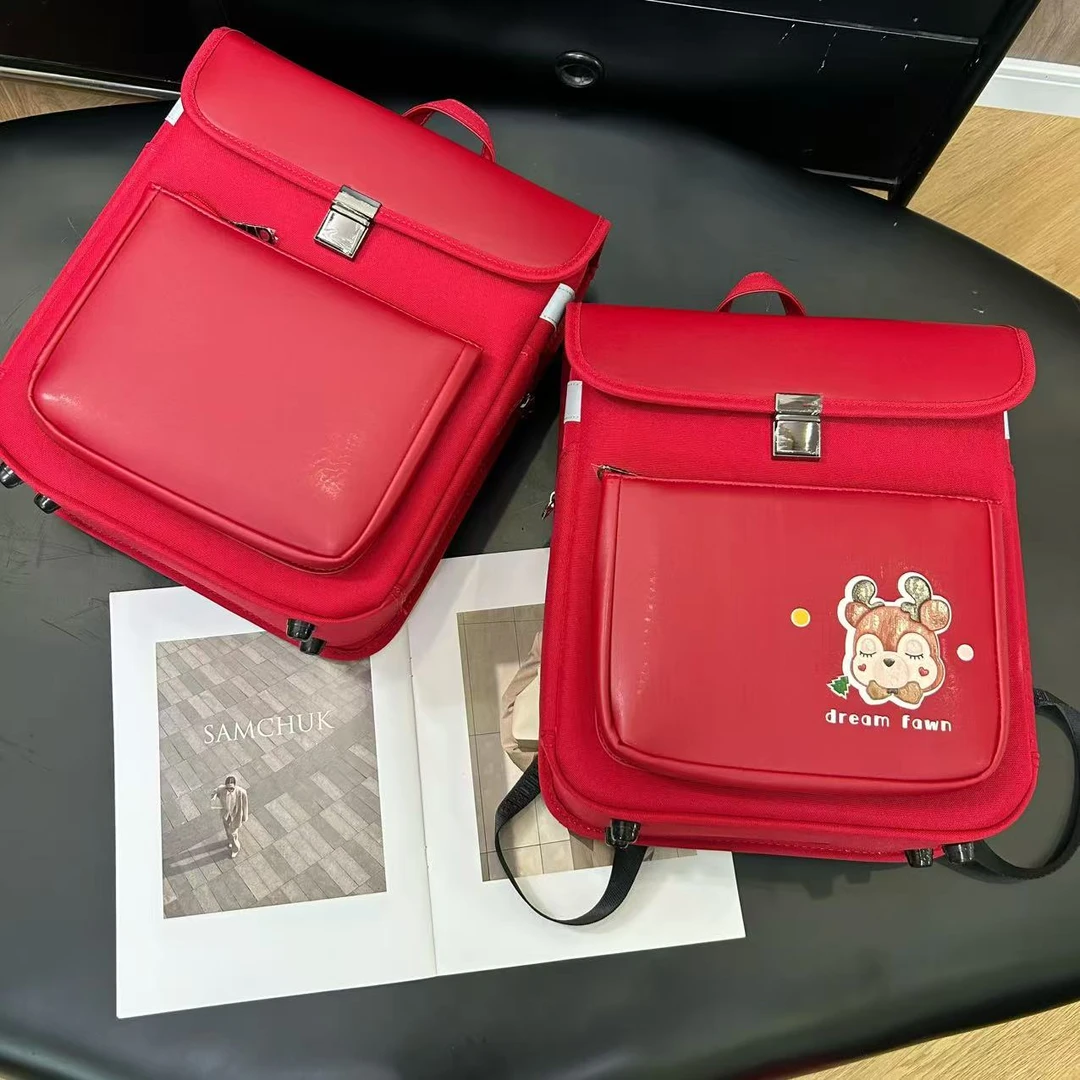 韩版小学生书包男女童超轻减负护脊双肩背包H7200