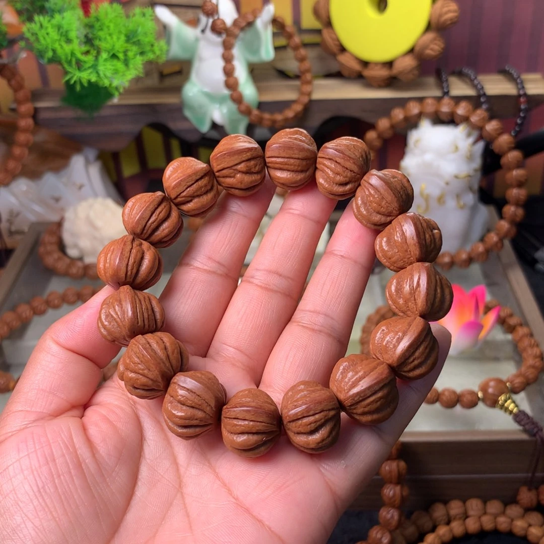 桃核吊坠佛手手串18