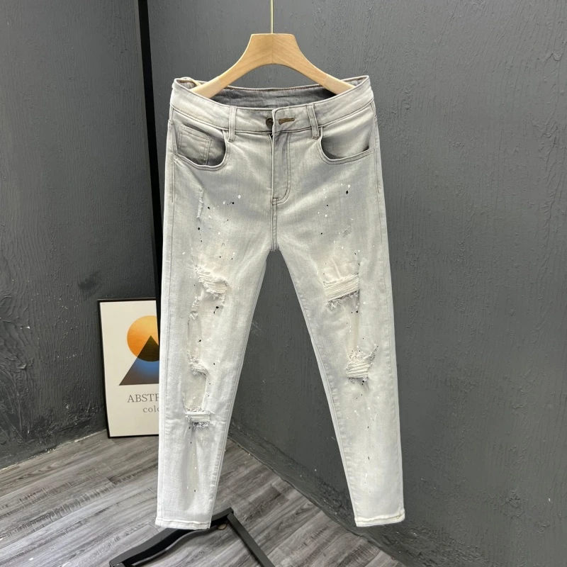 美式复古男士牛仔裤浅蓝色破洞泼墨小脚休闲裤潮流弹力修身九分裤