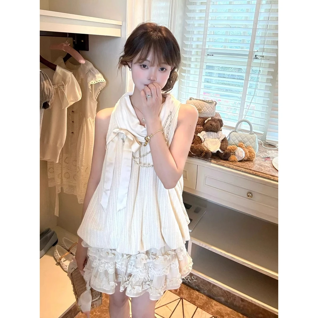 【杏运蛋糕】夏季新款设计感蝴蝶结无袖上衣女蓬松花边短裙两件套装