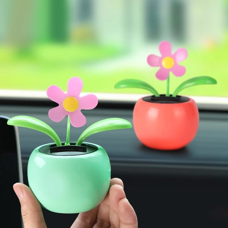 网红汽车内摆件创意可爱太阳能摇头花小车上车载装饰品太阳花女生