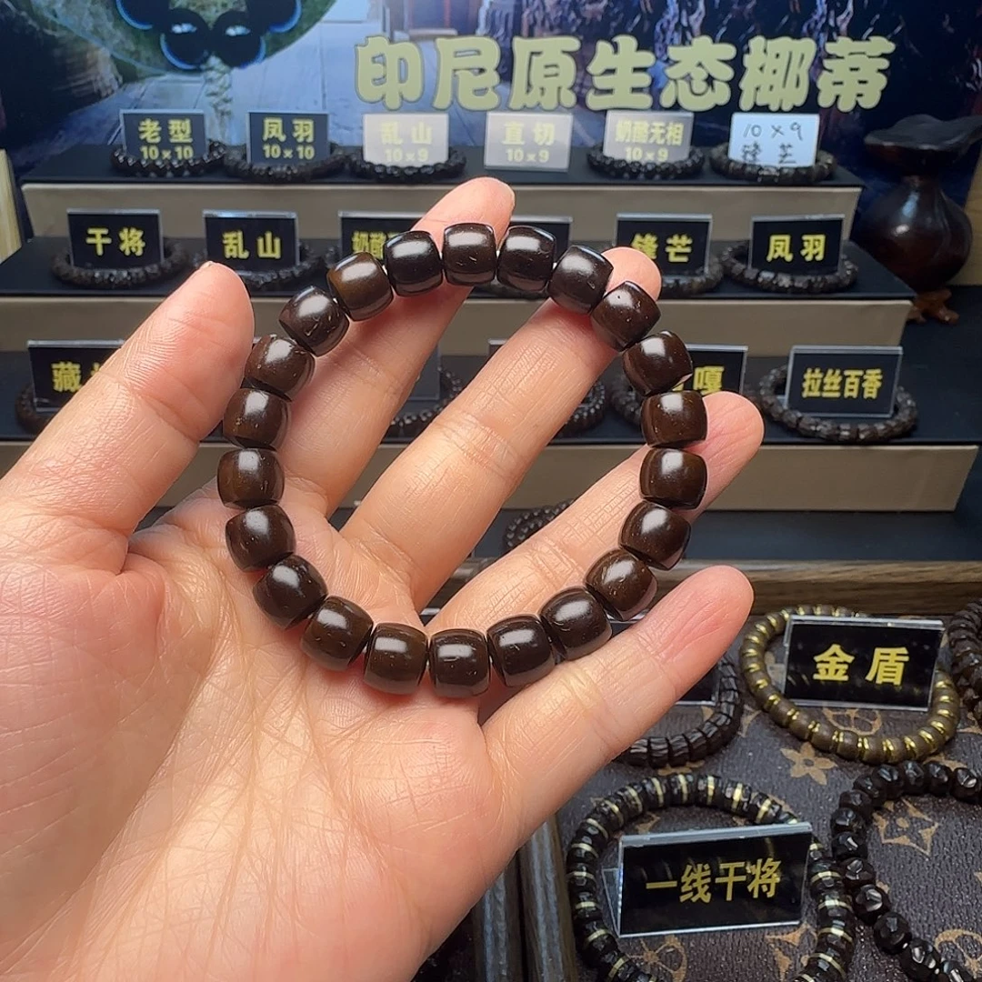 云***轻椰蒂吊坠印尼原生态椰蒂直切10×9