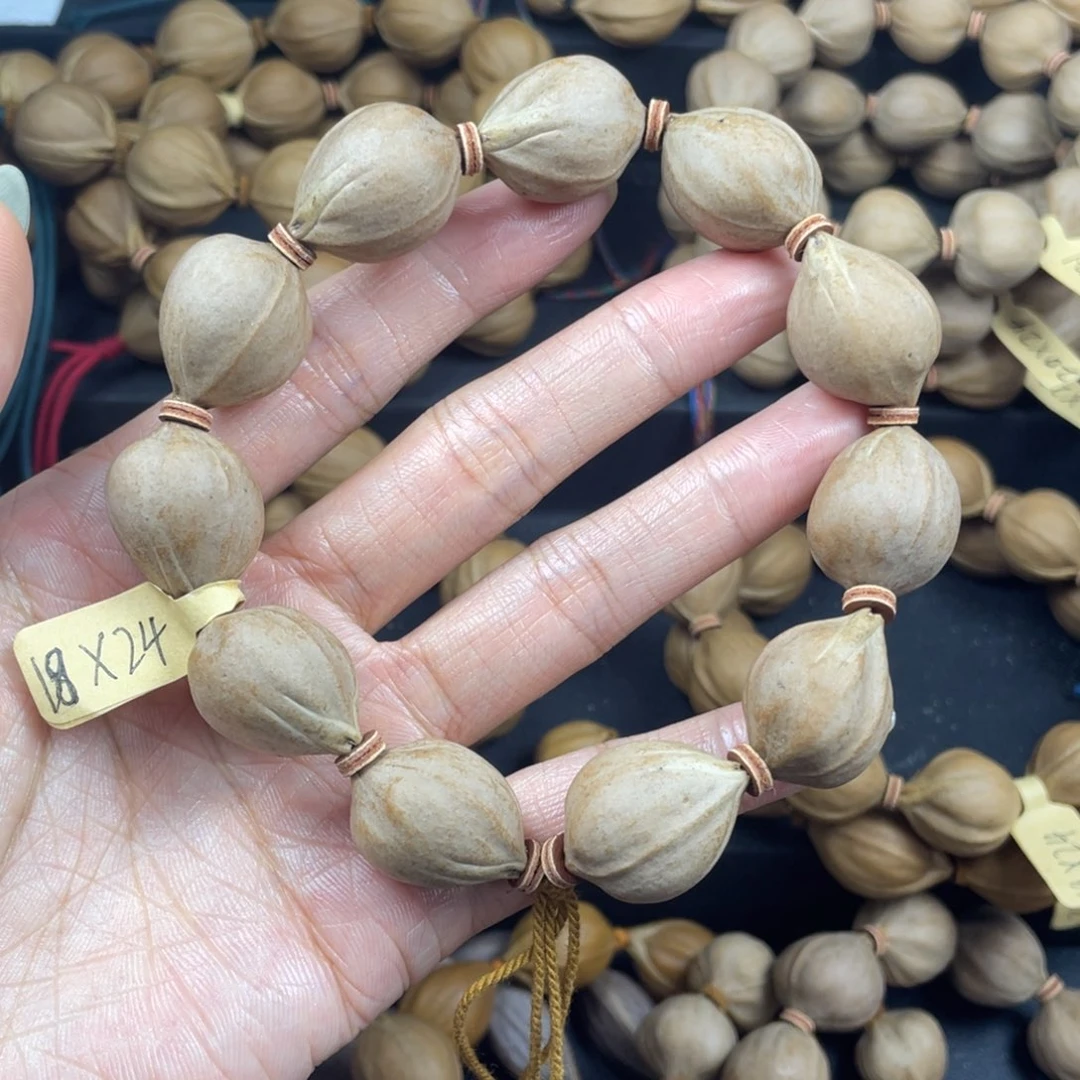 001橄榄核三花18*24