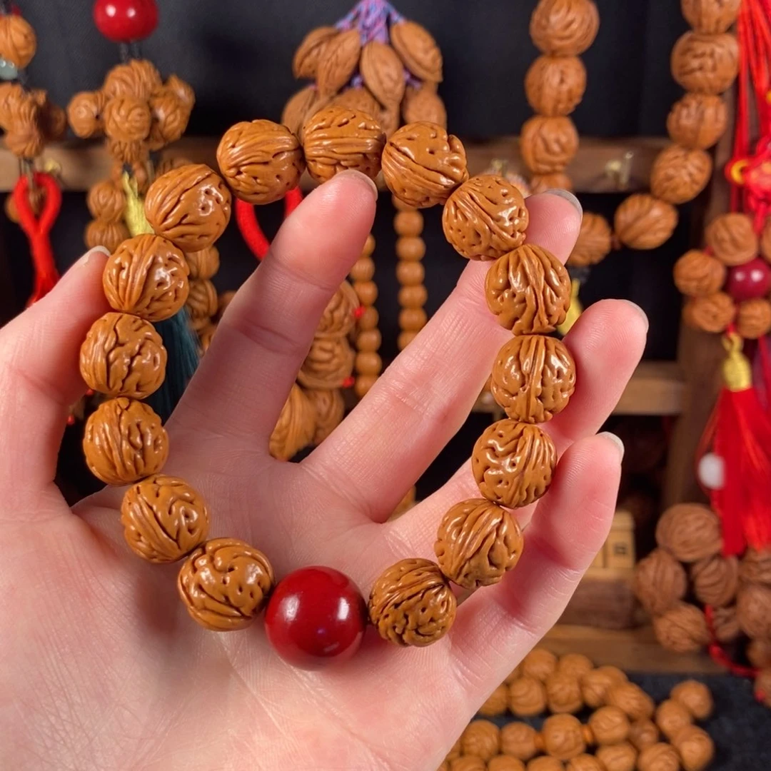 吊坠桃核桃枭手串
