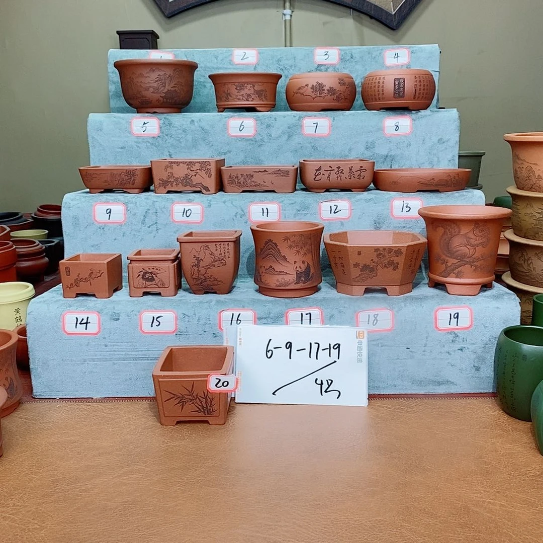 润***雨紫砂花盆我在看书