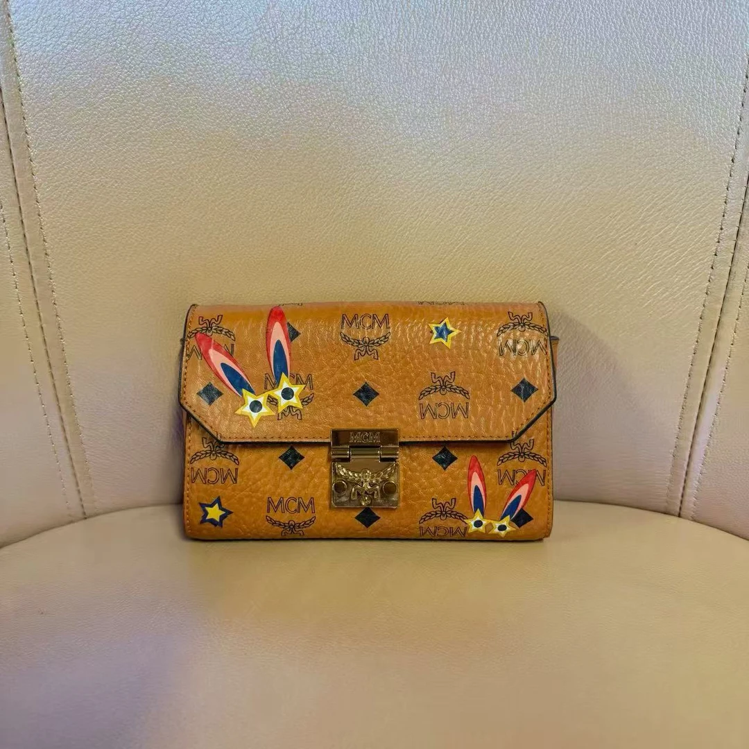 99新 MCM 安洁利严选钱包/66