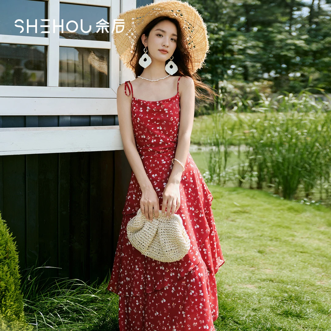 佘后不规则纯欲风碎花红色吊带连衣裙2025夏季新款海边度假长裙