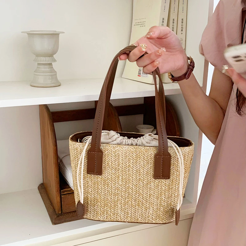 手提包女2025新款夏天编织包包高级感小众洋气单肩斜挎包通勤小包