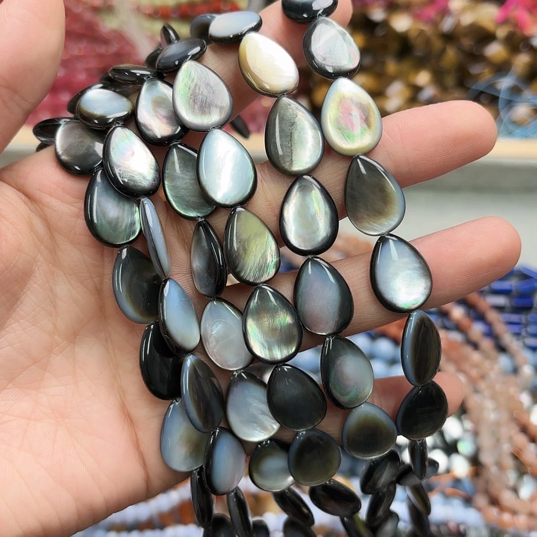 玛瑙/玉髓未镶嵌珠宝半成品13×18黑碟贝水滴一条