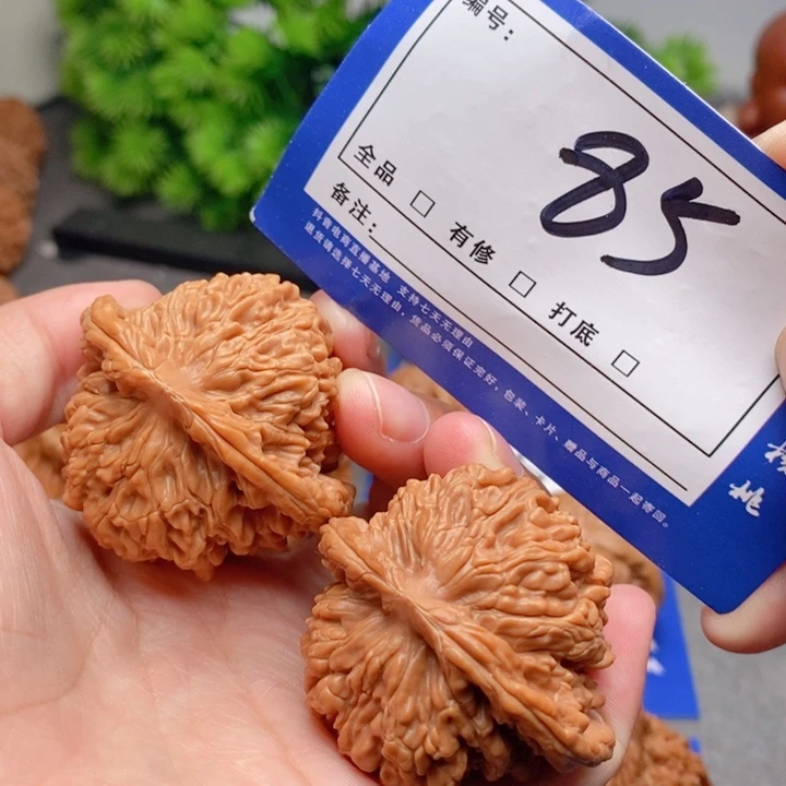 桃核把件倒*人44四座楼85号牌