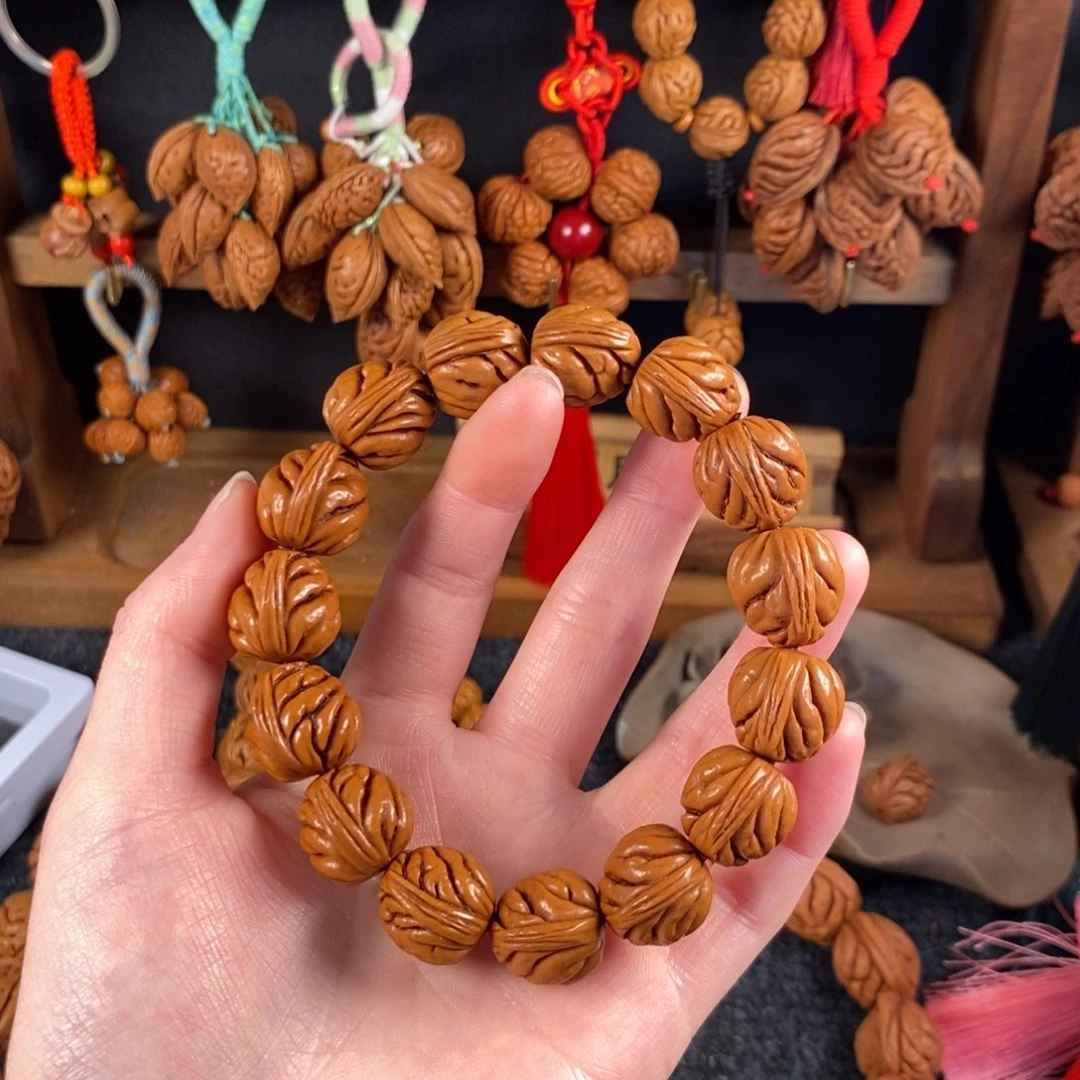 吊坠桃核桃枭手串