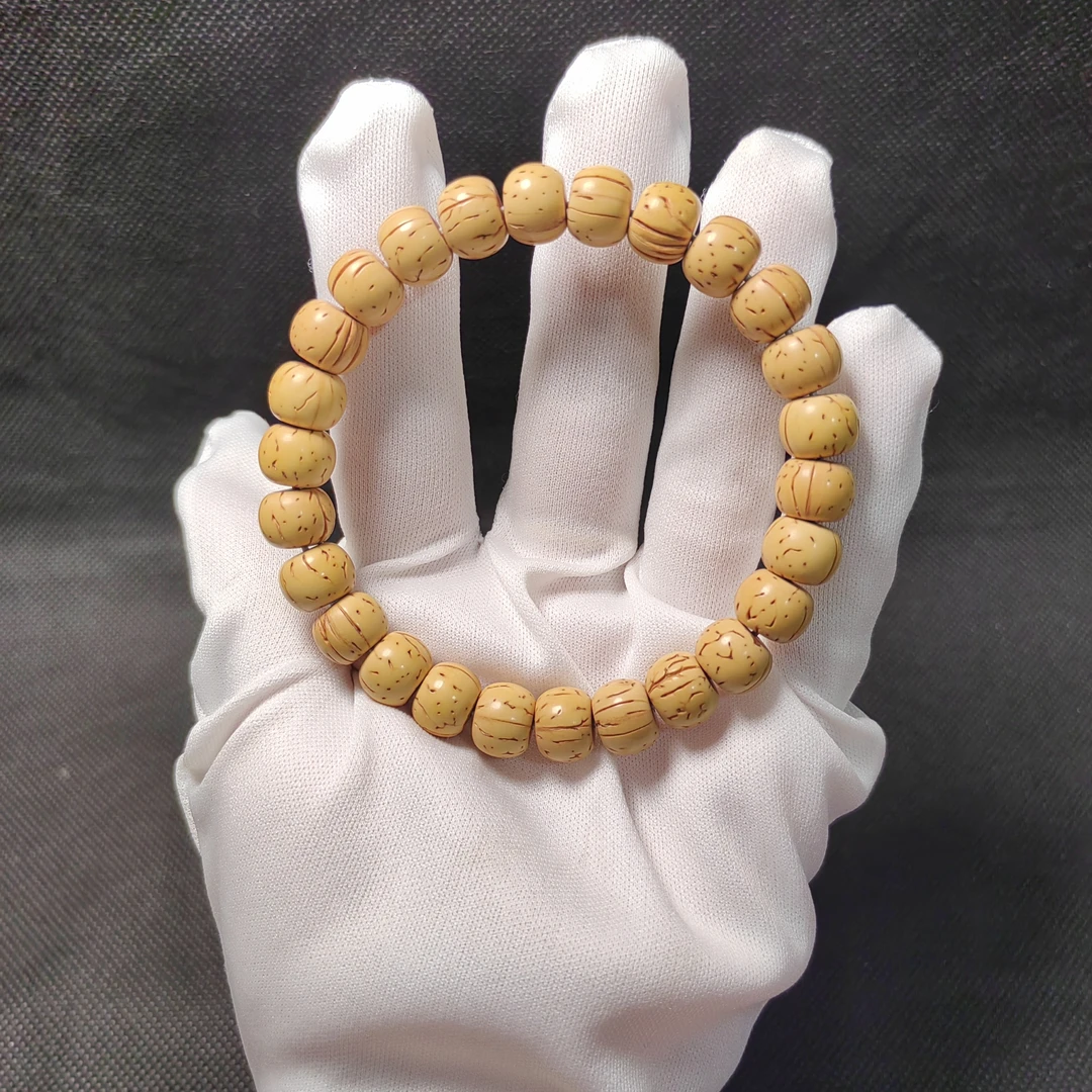 奶油皮桃核9-11镶嵌无纹桃核管，精品，皮质密度好！！