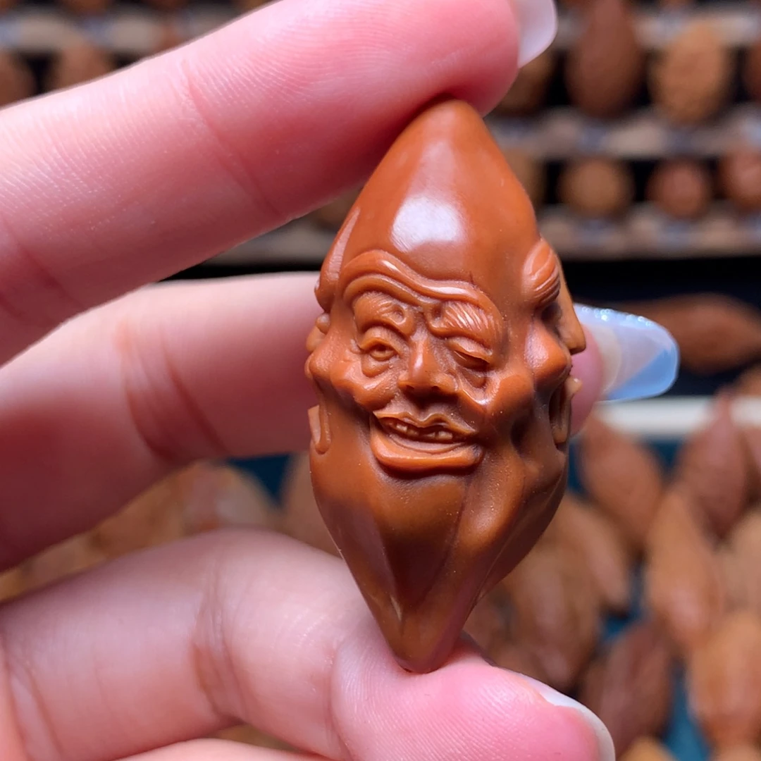 橄榄核把件喜怒哀乐