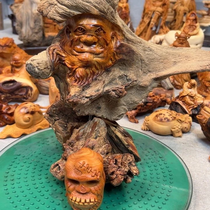 木赶**贝木雕手工制作手把件