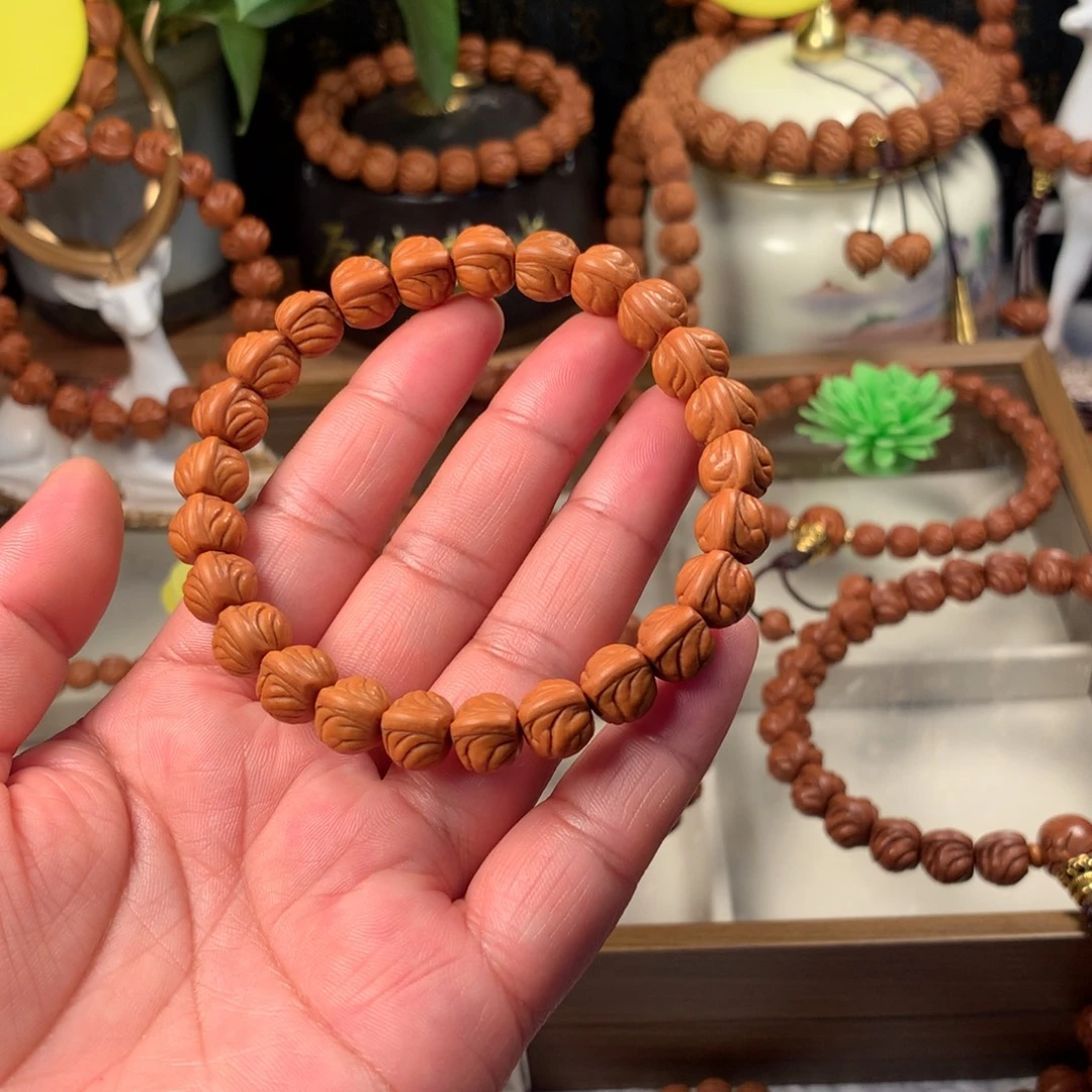 大***鱼桃核吊坠金玉龙手串10