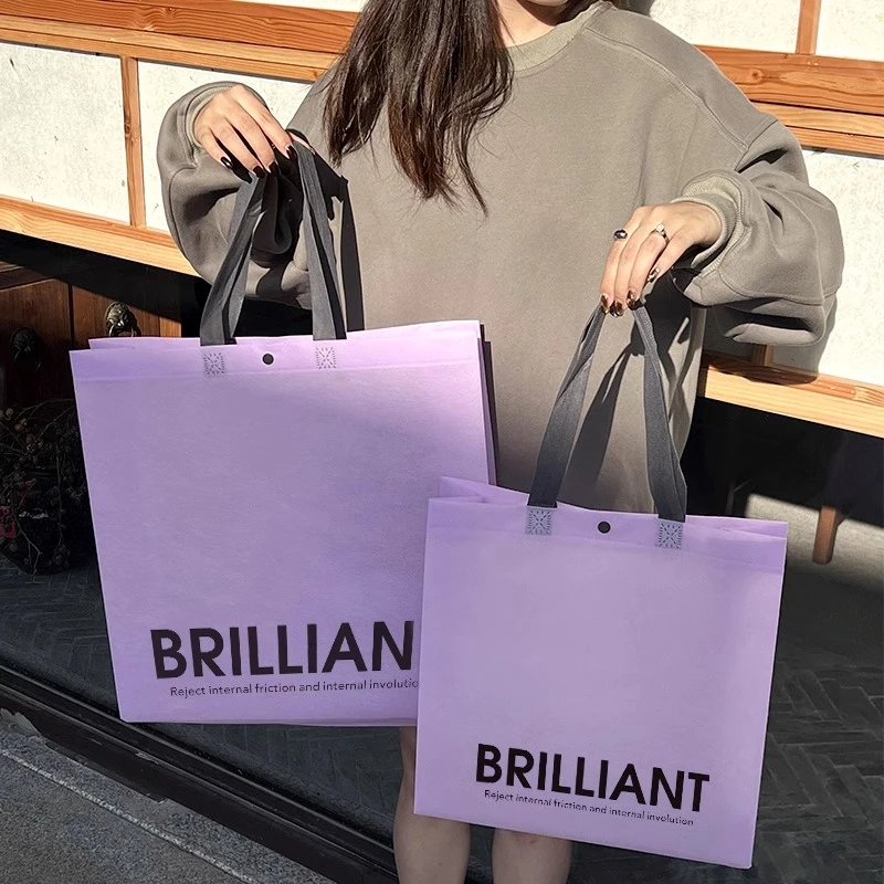 紫色网红女装暗扣服装店定制无纺布手提袋环保购物打包衣服用袋子
