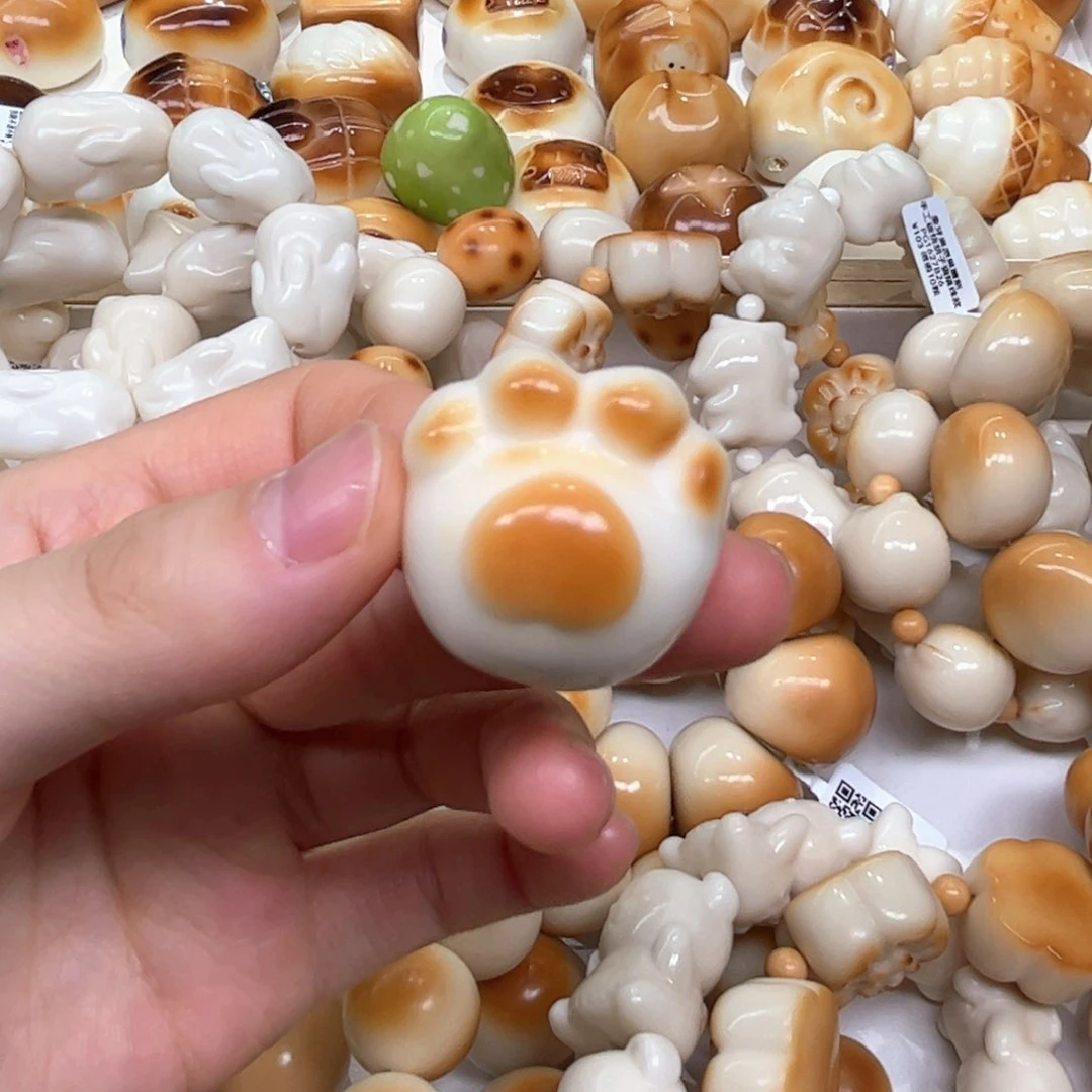 白玉菩提把件6.17.68象牙果猫爪