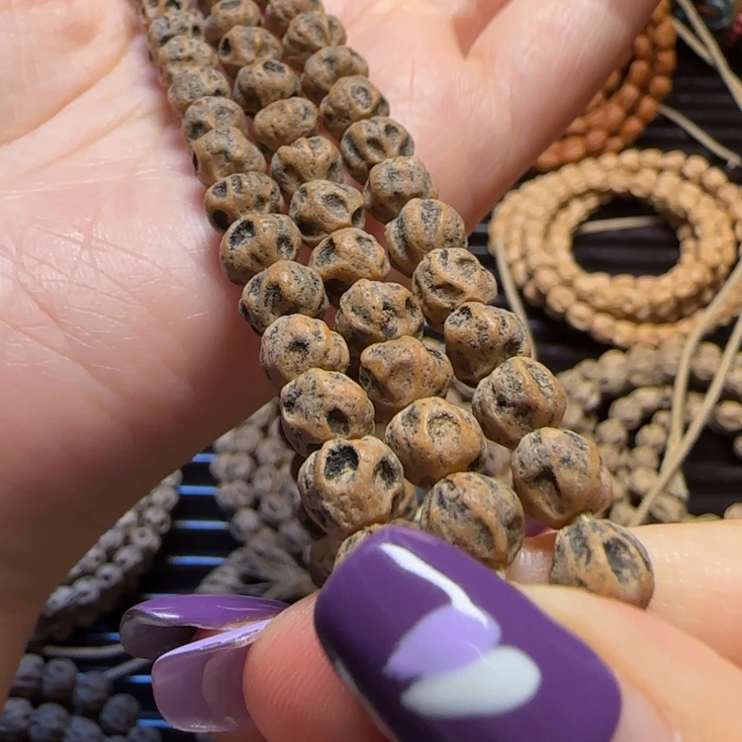 鑫***儿柏香籽/百香籽吊坠