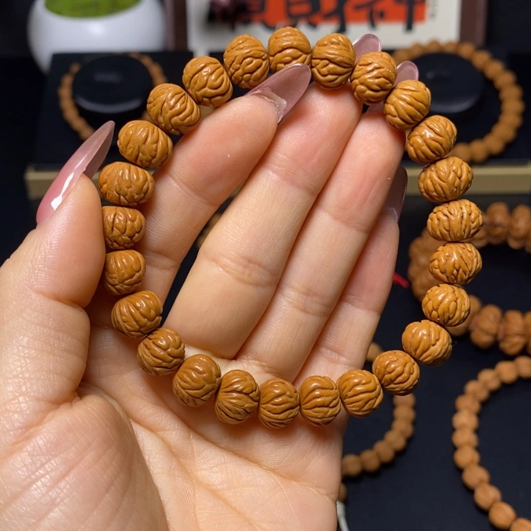 小***遢桃核吊坠秦岭文玩