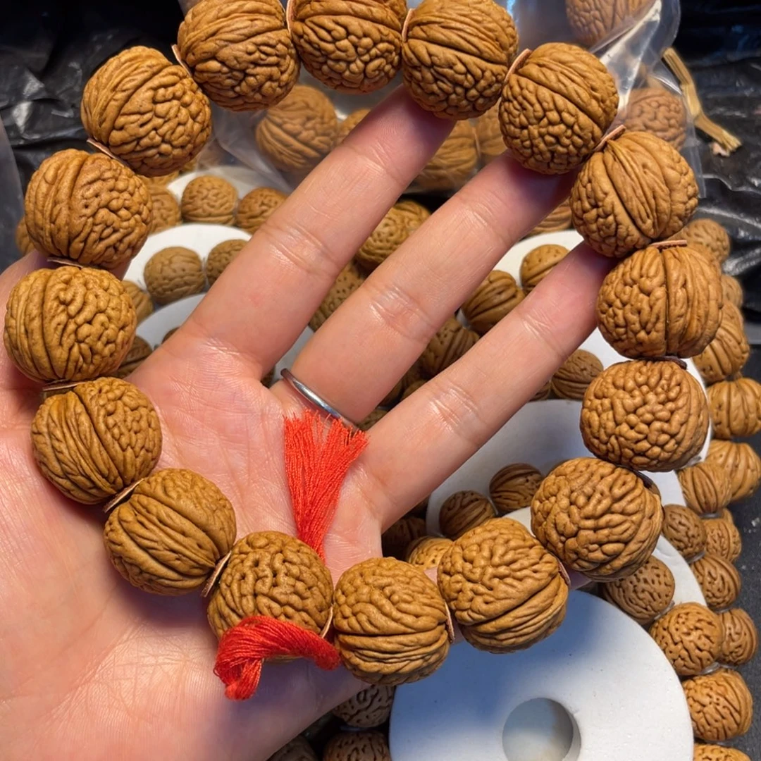 桃核吊坠桃核手串24.5龙鳞王