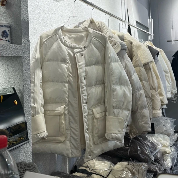 凤凰腾飞 国风 暗纹提花雕刻拼接90白鸭绒羽绒服