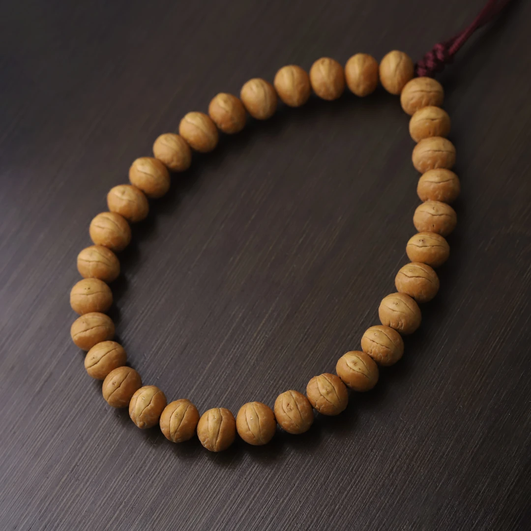 S9305-1【K1酸枣核小凤眼】高密近实心酸枣核小凤眼单圈文玩手串