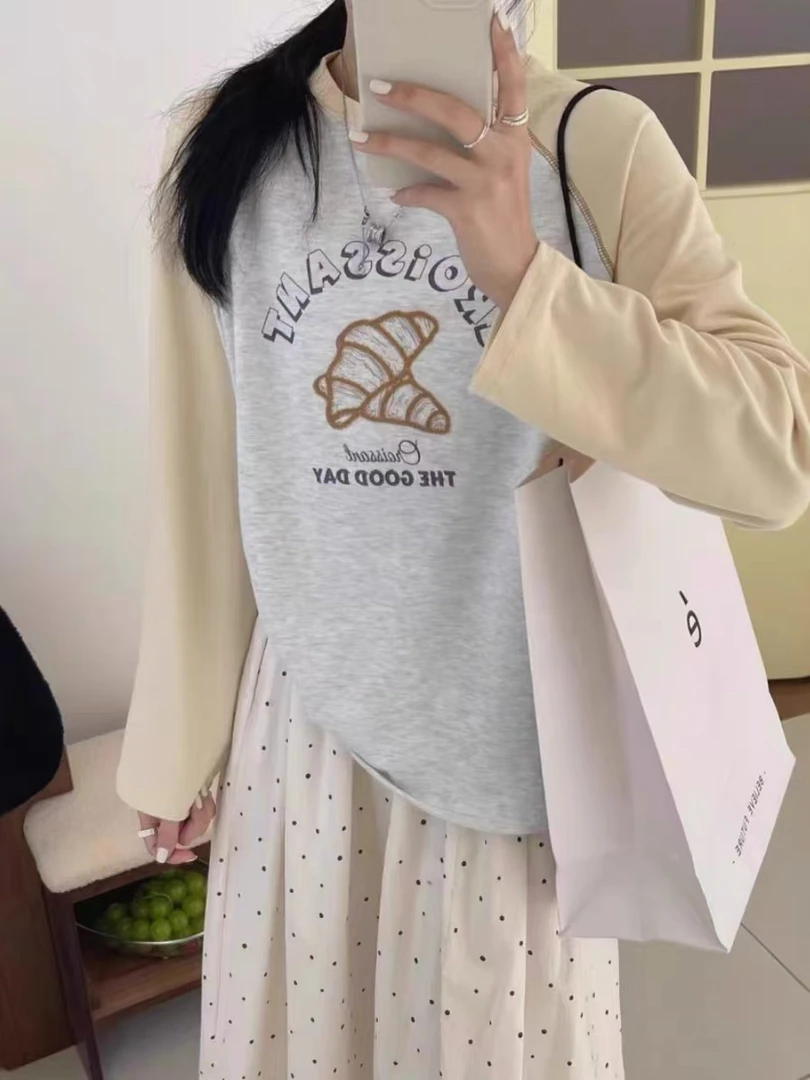 字母牛角包图案新款韩版休闲简约圆领插肩袖宽松长袖T恤打底衫