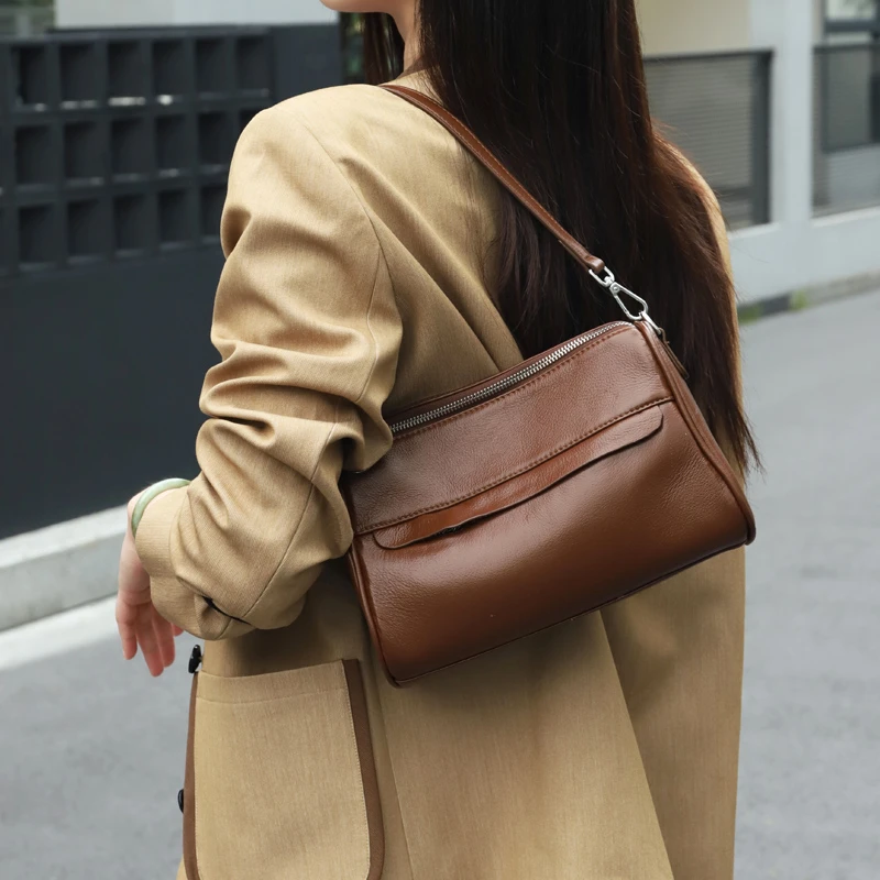 纯牛皮大容量单肩腋下包女百搭2025秋季新款真皮休闲斜挎包放雨伞