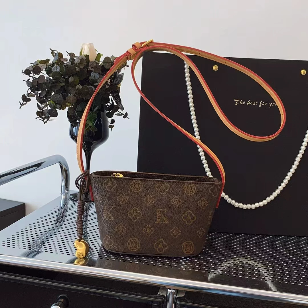 古缇蔻元宝包1191法式斜跨斜挎包水桶包经典防盗百搭复古风手机包