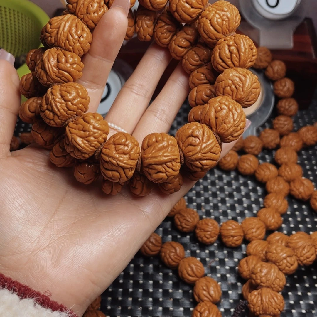 桃核手串一****狗秦岭龙纹桃核