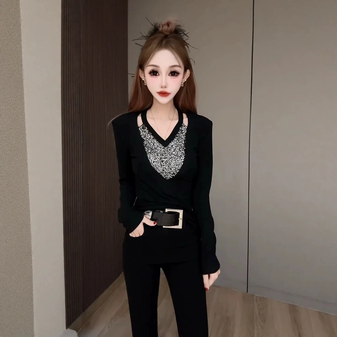 冬季镂空亮片V领拼接长袖T恤女气质修身显瘦别致百搭打底衫