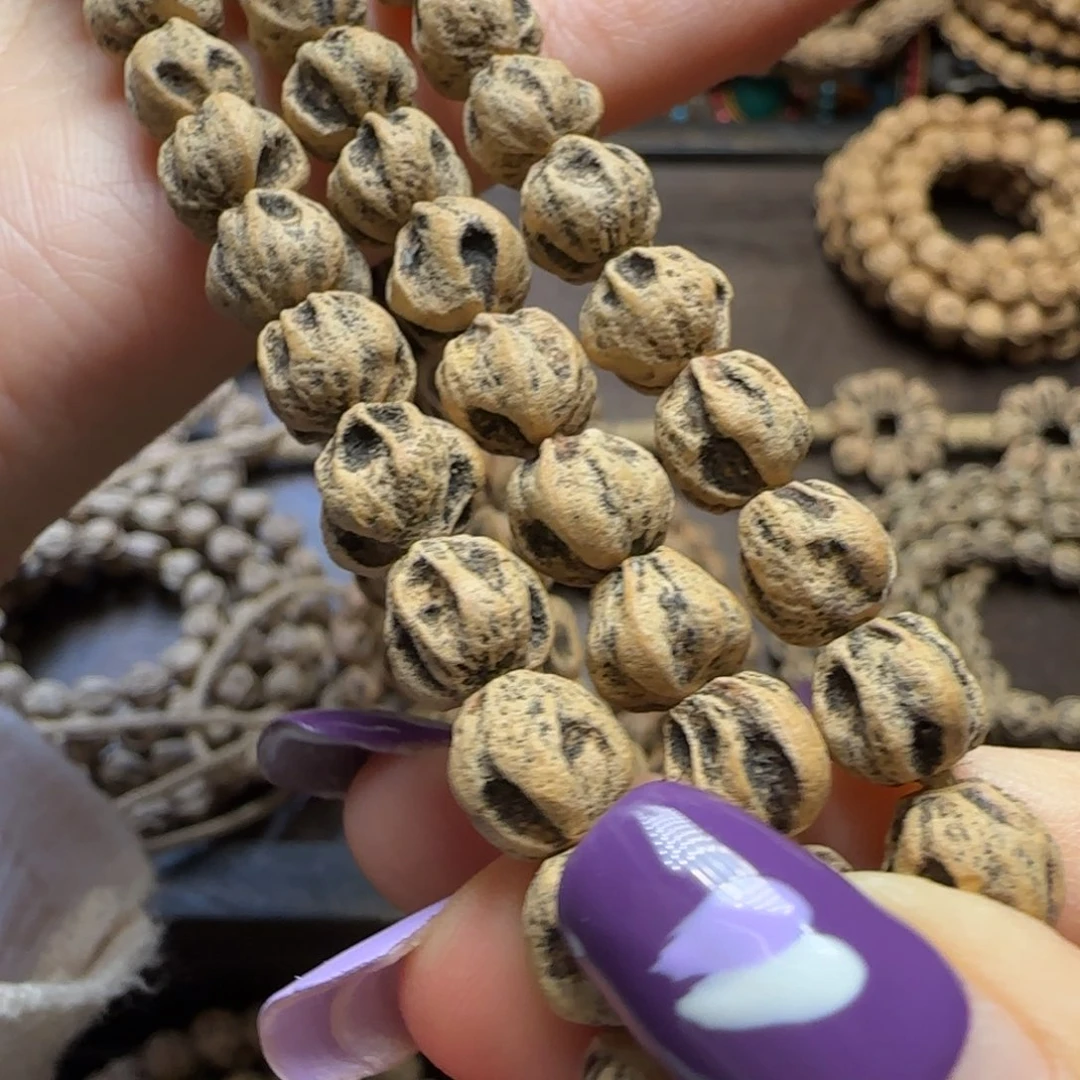 烛***餐柏香籽/百香籽吊坠