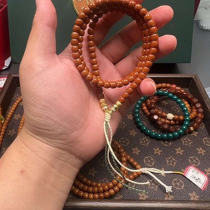 橄榄核吊坠6.4mm老挝核尖极限弧108三花白