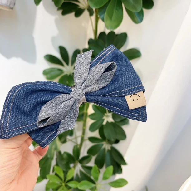 P66牛仔蓝色蝴蝶结懒人夹