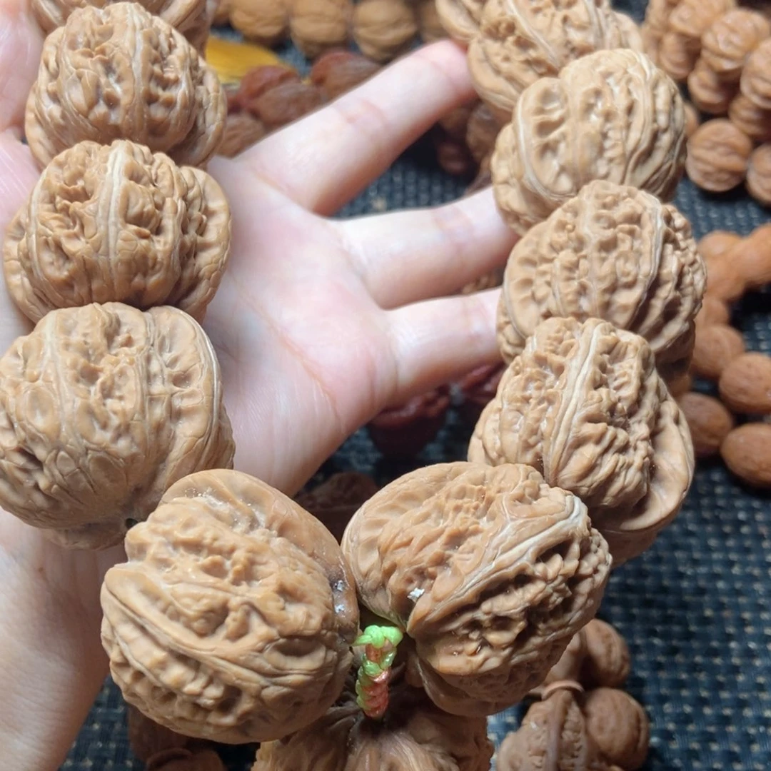 T***下吊坠文玩核桃元宝手持