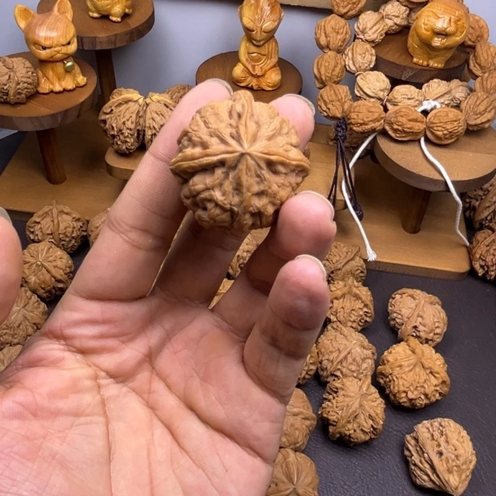 哈***哈桃核吊坠三棱半一个小众