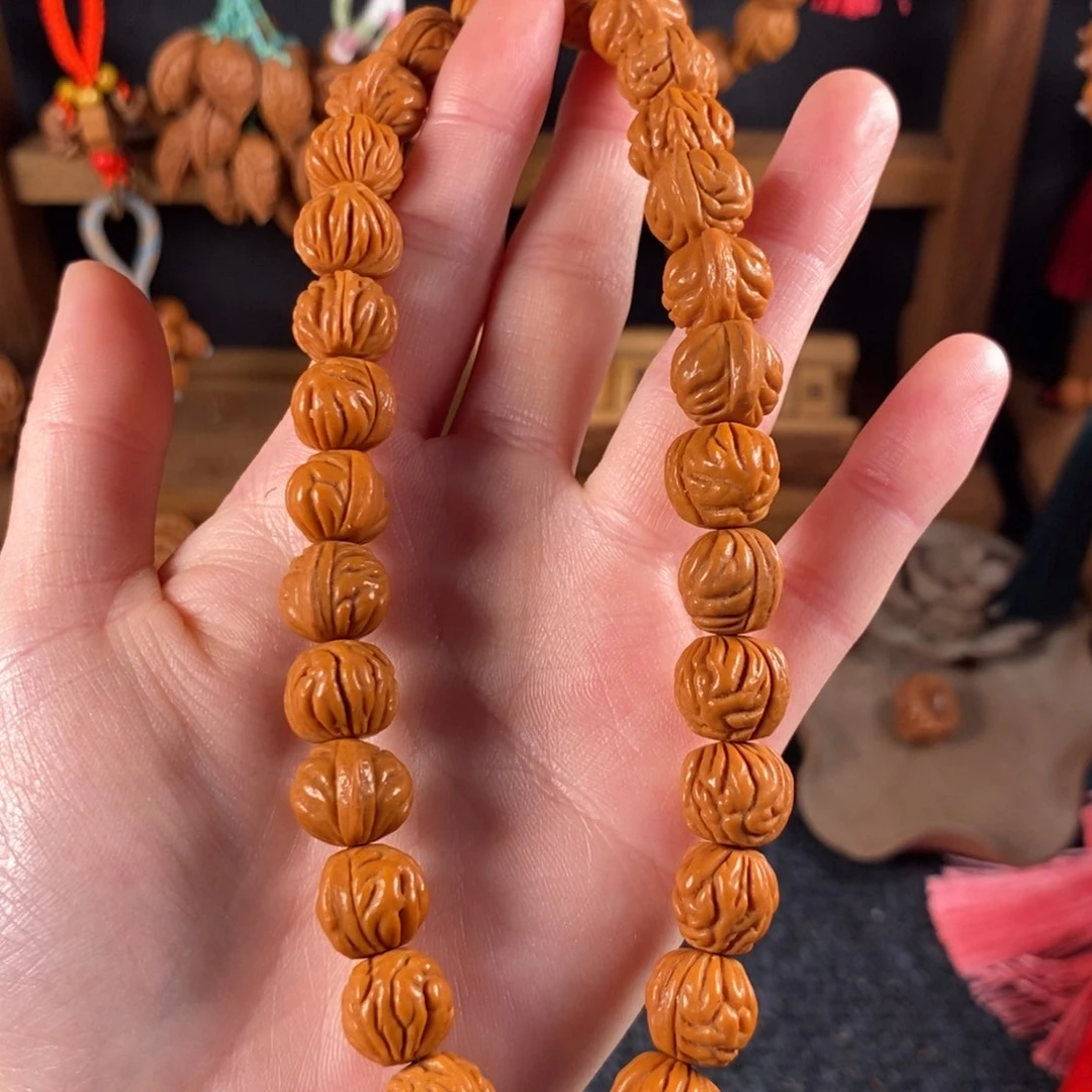 吊坠桃核桃枭手串