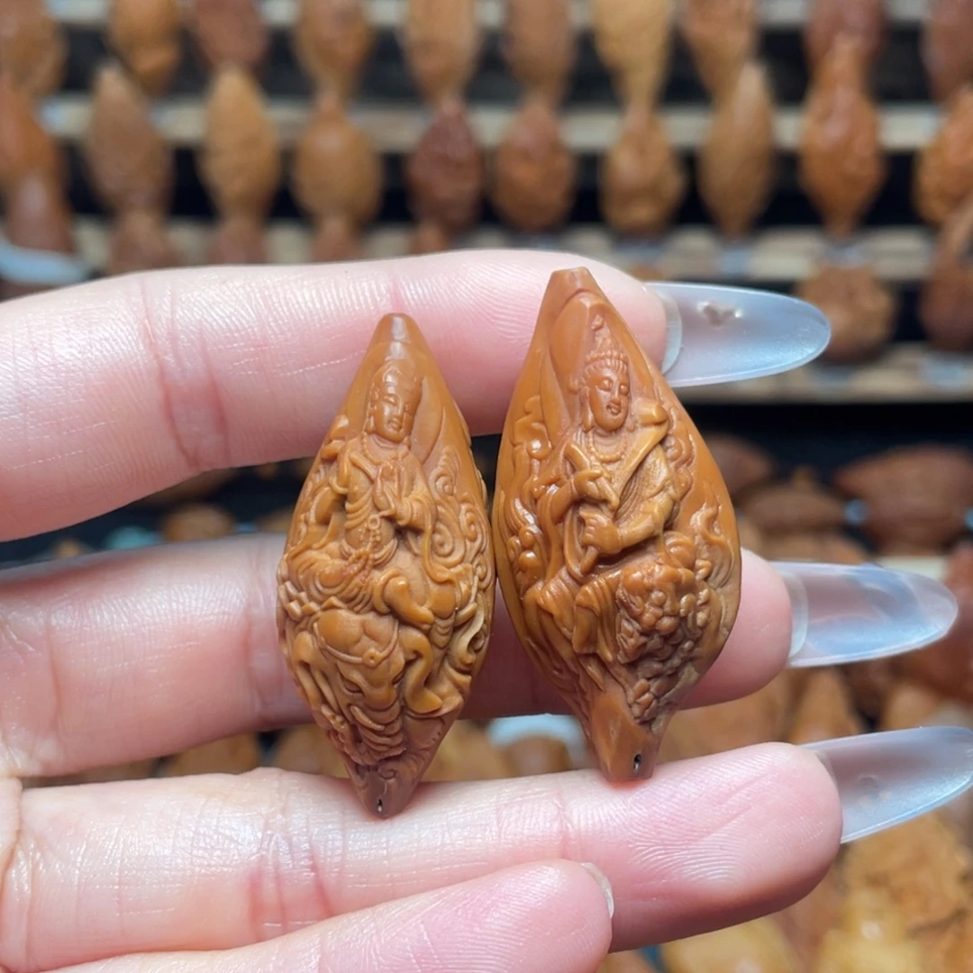 子***韬橄榄核把件文殊普贤