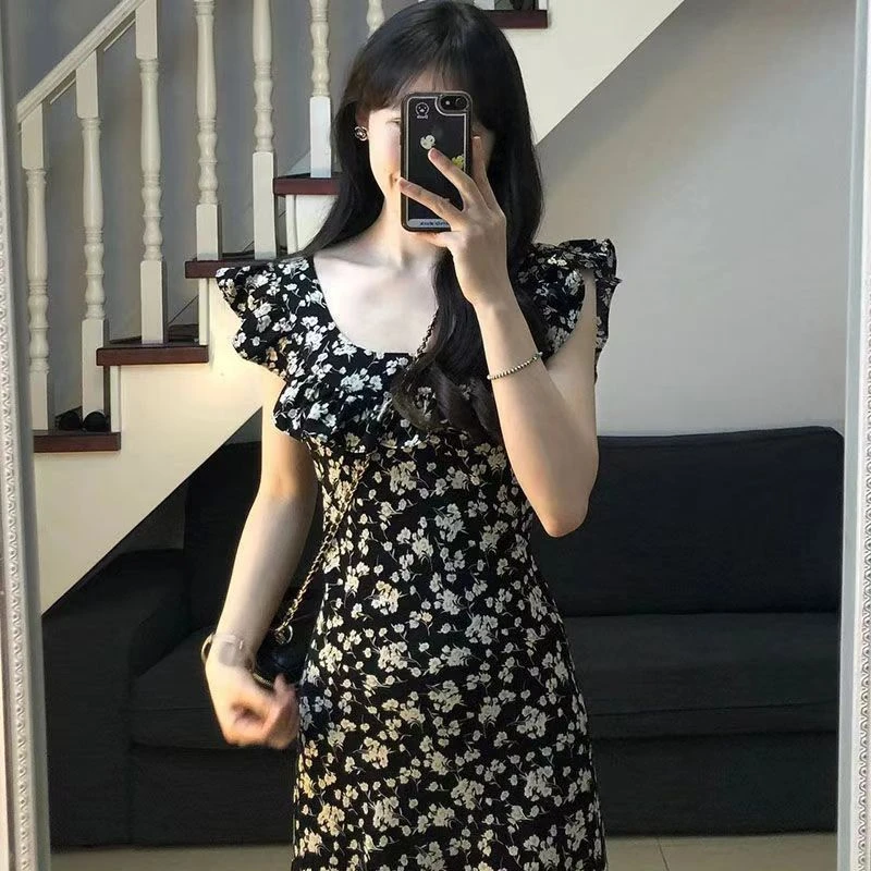 夏季沙滩裙茶歇法式赫本风黑色碎花连衣裙子新款气质收腰长裙高级