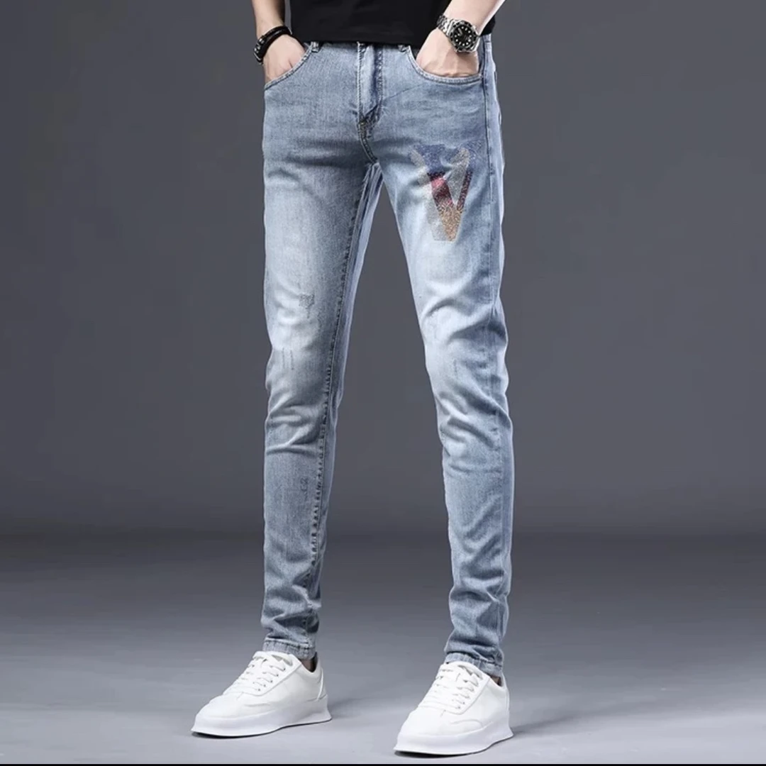 25早春潮牌个性1128时尚重工烫钻痞帅百搭修身小脚弹力男士长裤