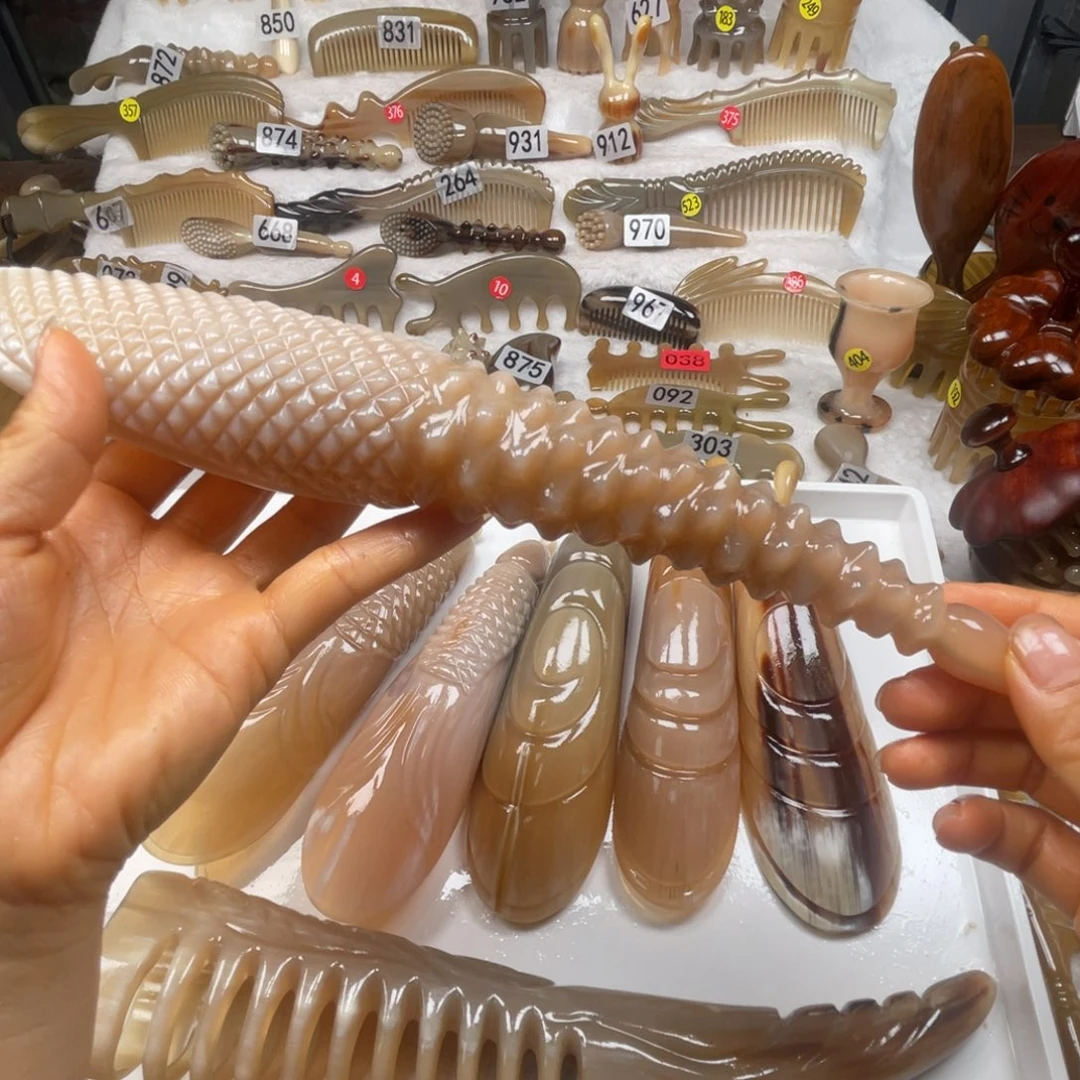 阳***你牛角梳福利款梳子