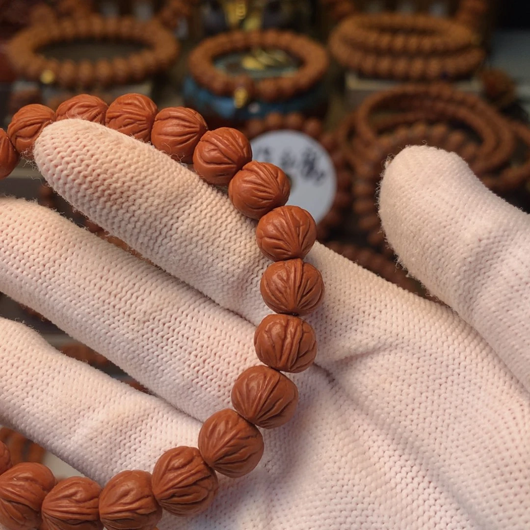 看***透桃核手串秦岭龙纹