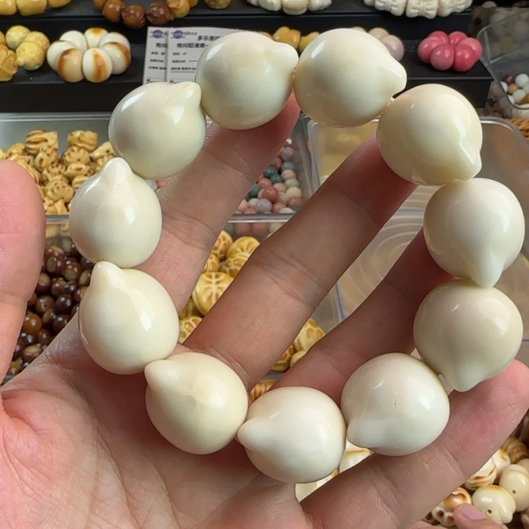 吊坠菩提根/象牙果微瑕卡25猫头一条（有一颗裂）