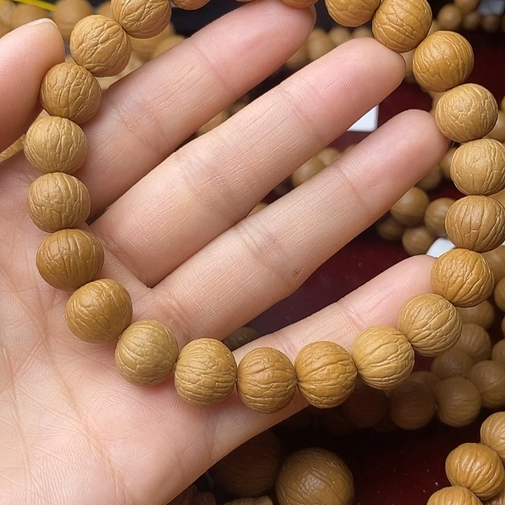 落****吊坠猴头核桃凤羽