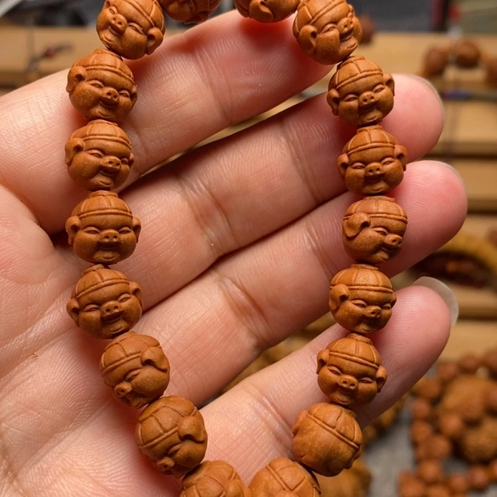 桃核雕刻福猪手串
