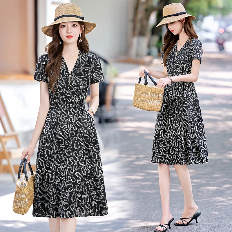 法式气质V领印花连衣裙女2025夏季新款轻熟风洋气时髦中长款裙子