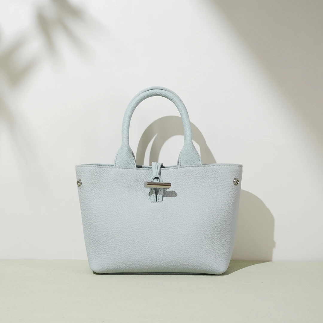 都市简约斜挎包百搭简约风休闲手提包包布包水桶包纯色时尚托特包