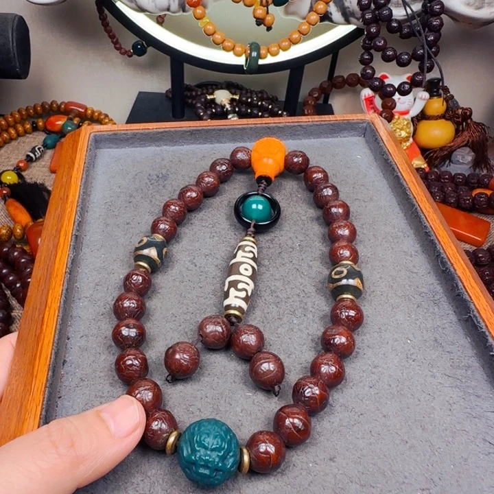 凤眼菩提吊坠手持