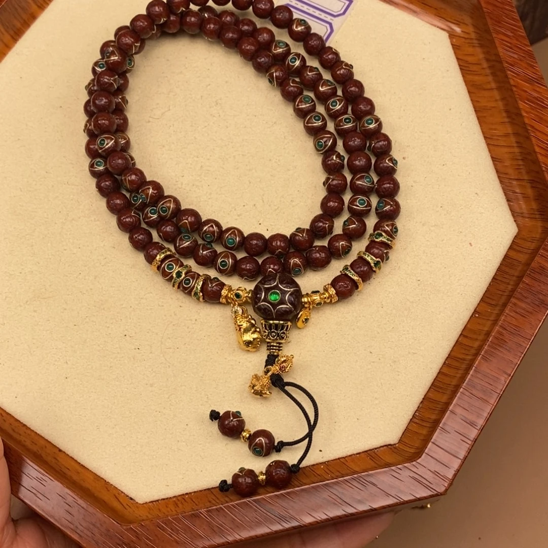 恩***.凤眼菩提吊坠凤眼